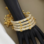 Set of 4 White Pearl-Finish Bangles with Crystal and Gold Accents
