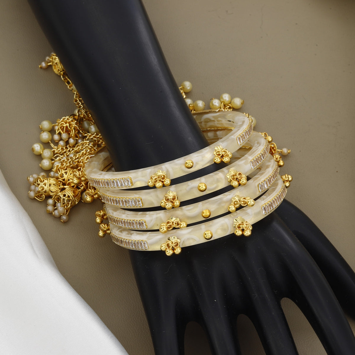 Set of 4 White Pearl-Finish Bangles with Crystal and Gold Accents