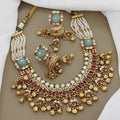 Grand Kundan & Ruby Necklace Set with Jhumka Earrings