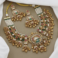 Regal Kundan & Ruby Necklace Set with Intricate Green Stone Detail
