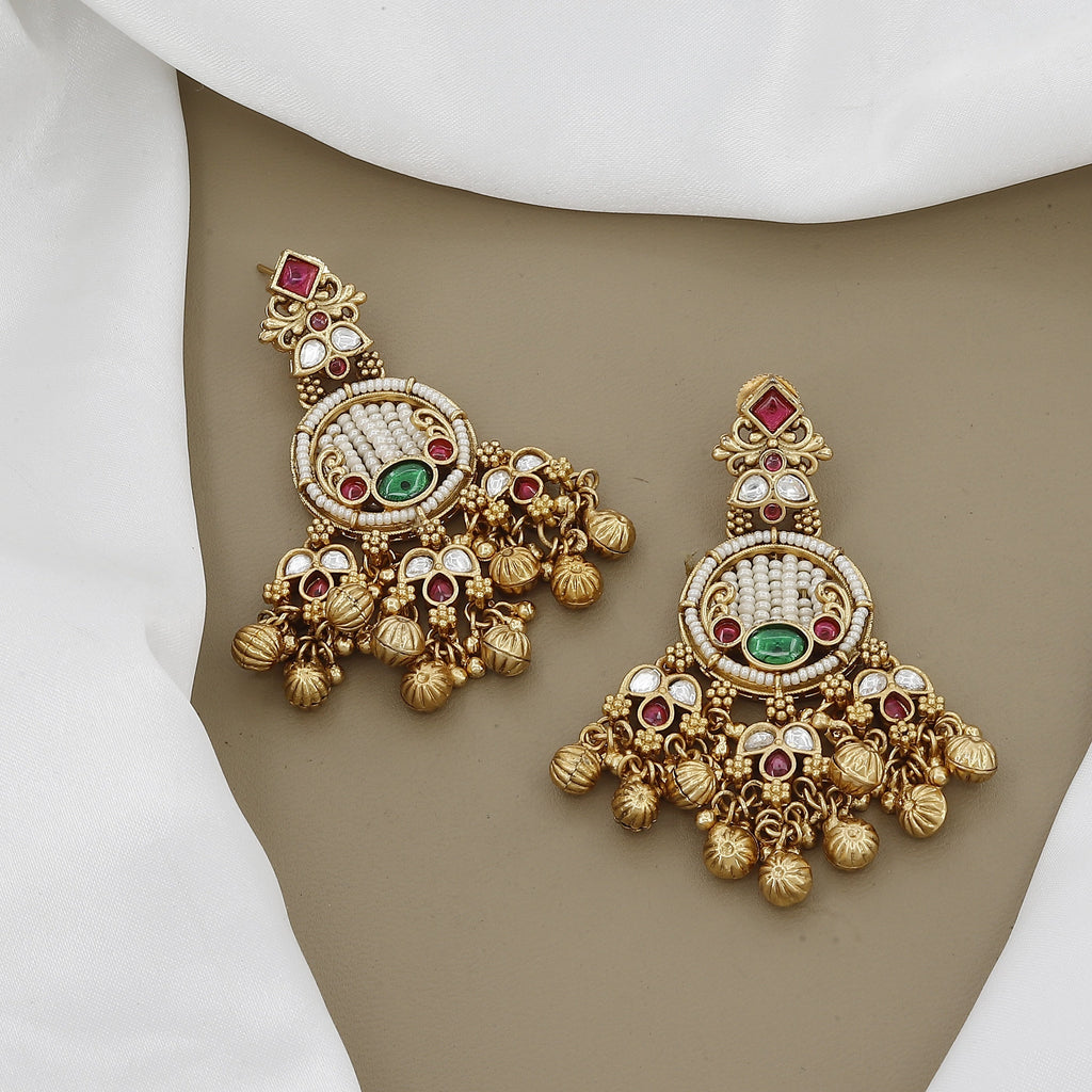 Regal Kundan & Ruby Necklace Set with Intricate Green Stone Detail