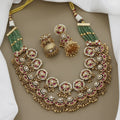 Luxurious Tiered Ruby & Kundan Necklace Set with Green Beaded Chain