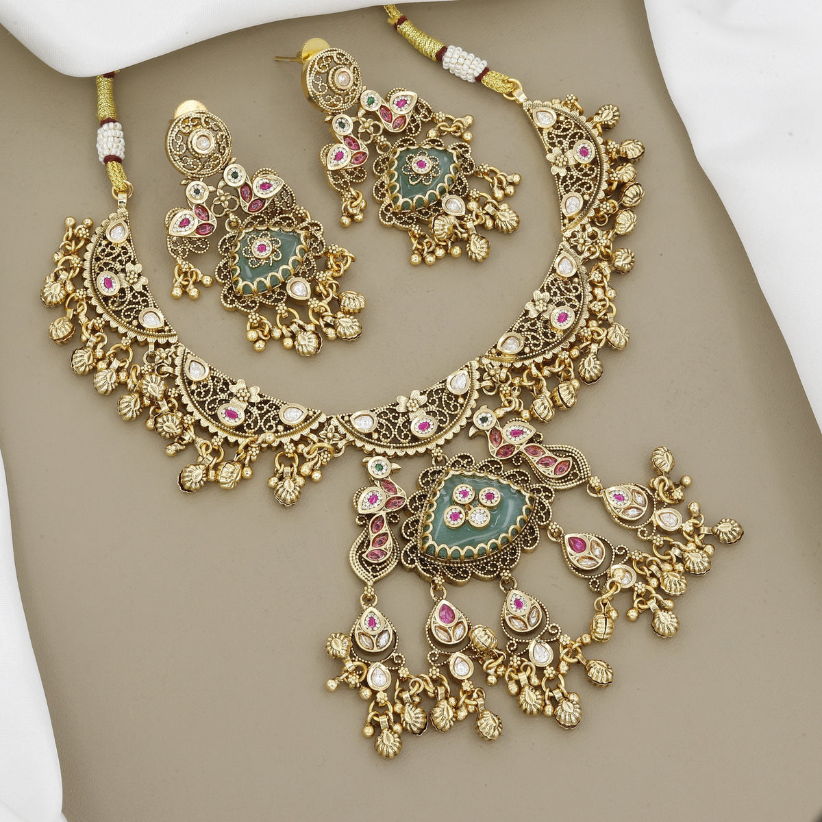 Antique Gold-Plated Temple Jewelry Set with Green Stones & Peacock Motifs