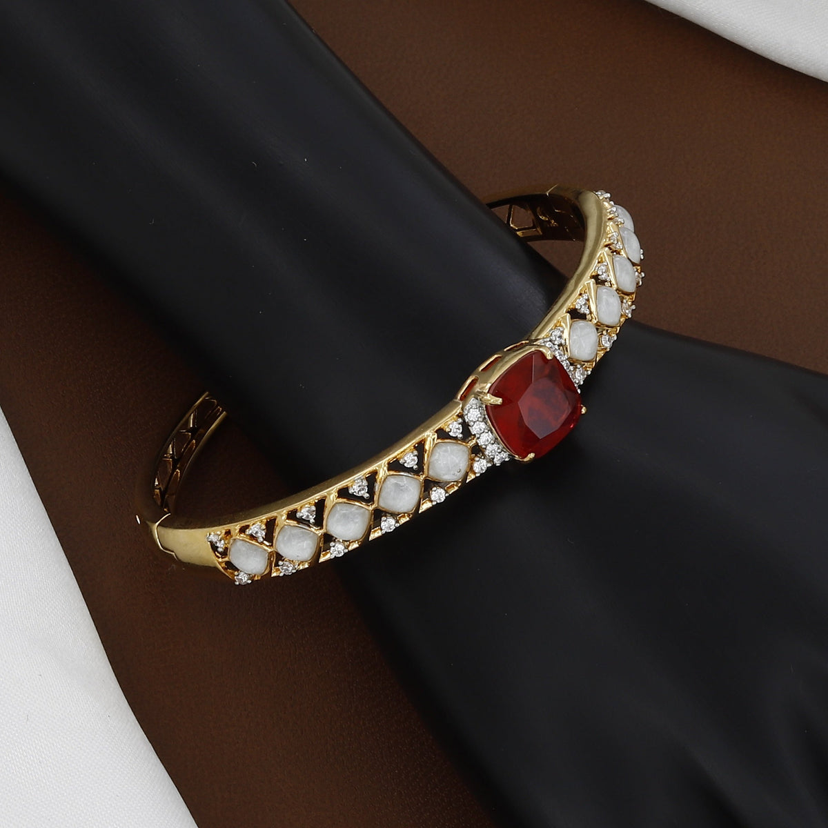 Gold Polished Regal Crimson Solitaire & White Stone Designer Bangle
