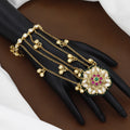 Antique Gold-Plated Kundan Hathphool with Floral Medallion and Ghungroo Drops