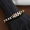 Gold-Tone Geometric Bangle with Square-Cut Crystals & Pave Band