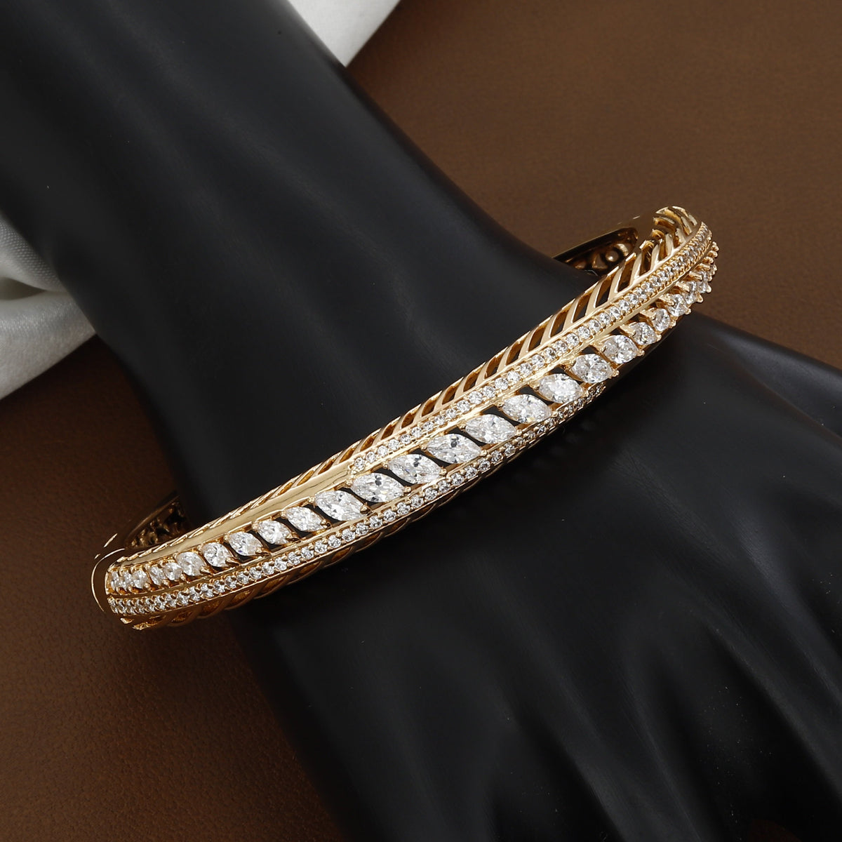 Gold-Tone Marquise Crystal Bangle with Textured Chevron Detailing