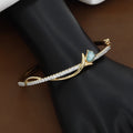 Gold Floral Tulip Bangle with Turquoise Stone