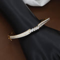 Gold Chevron Diamond Bangle with Baguette Accents