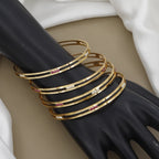 Set of 4 Thin Gold Toned Bangles with Ruby & CZ Stones