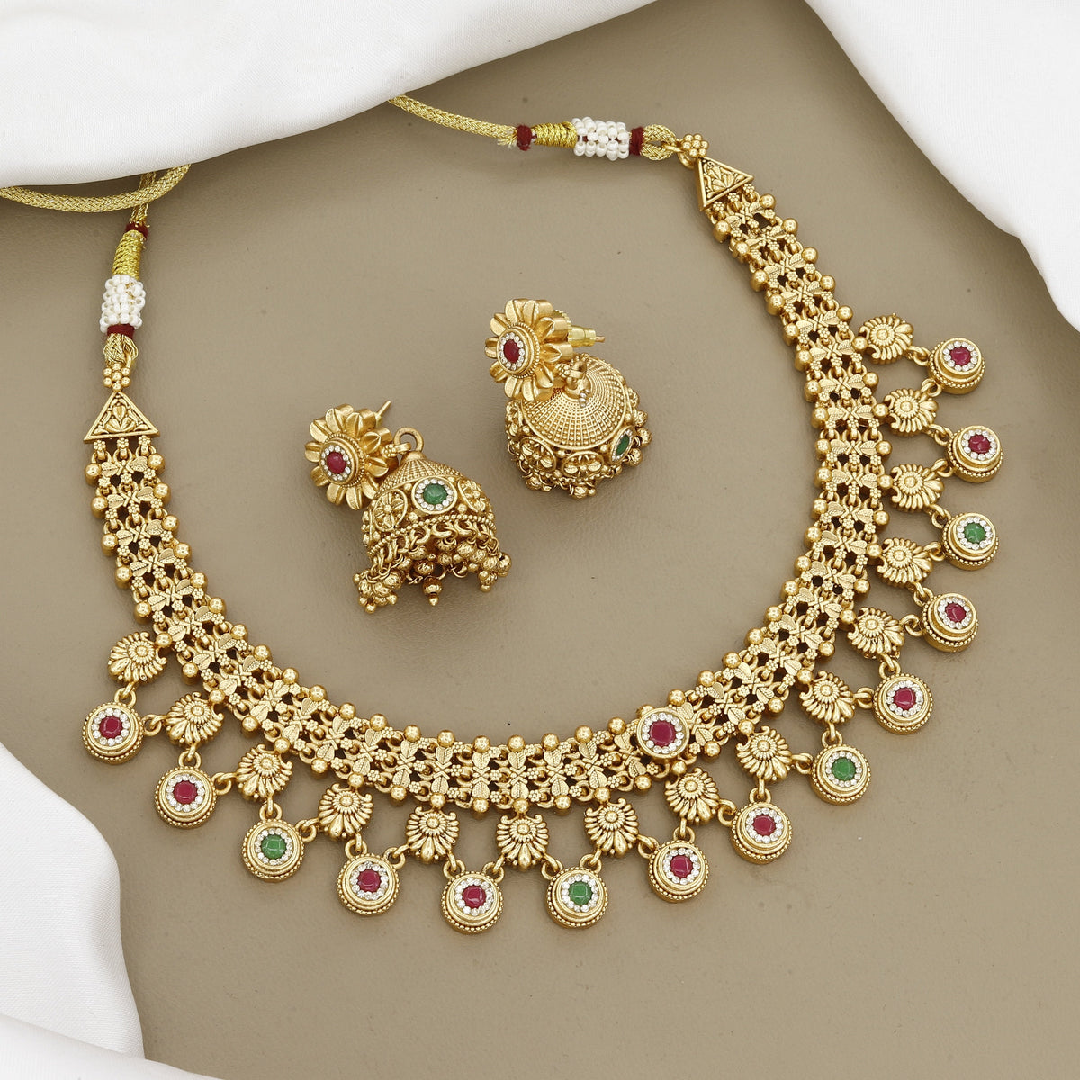 Traditional Gold-Plated Sun-Motif Temple Necklace Set with Ruby & Emerald Beads
