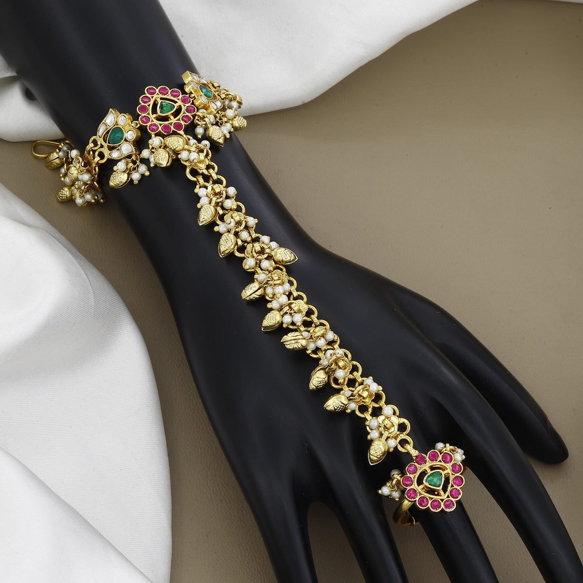 Traditional Gold-Plated Pearl Hathphool with Pink & Green Stones
