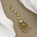 Floral Gold-Plated Maang Tikka with Kundan Accents and Green Beads