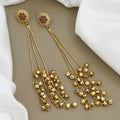 Antique Gold-Finish Long Dangle Earrings with Stone-Studded Floral Tops